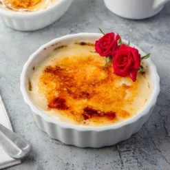 Acopa 8 Oz. Round Bright White Fluted Porcelain Souffle / Creme Brulee Dish - 36/Case