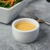 Acopa 2 Oz. Bright White Smooth Porcelain Ramekin - 12/Pack