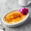 Acopa 6 Oz. Oval Bright White Fluted Porcelain Souffle / Creme Brulee Dish - 12/Pack -Acopa Shop 1782698