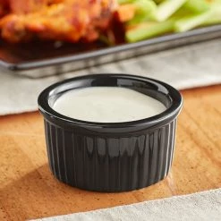 Acopa 2.5 Oz. Glossy Black Fluted Stoneware Ramekin - 48/Case