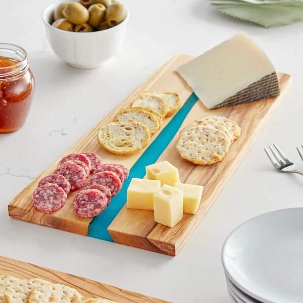 American Metalcraft OWP14 14" X 7" X 5/8" Rectangular Olive Wood Serving Board With Blue Polyresin Streak 3 American Metalcraft OWP14 14" X 7" X 5/8" Rectangular Olive Wood Serving Board With Blue Polyresin Streak